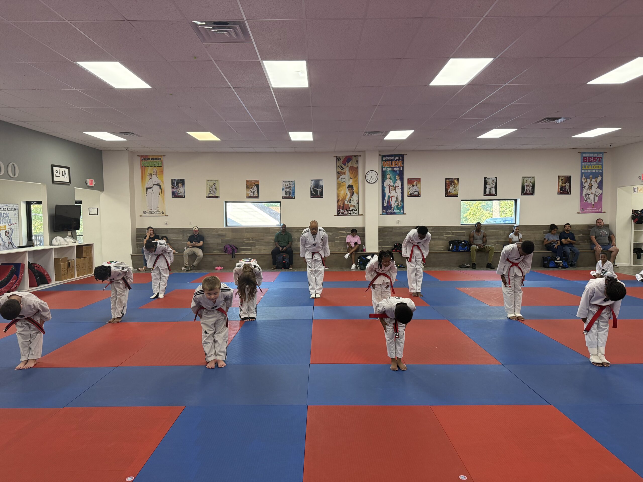 Children practicing focus and concentration during Tae Kwon Do class at Master Shim's